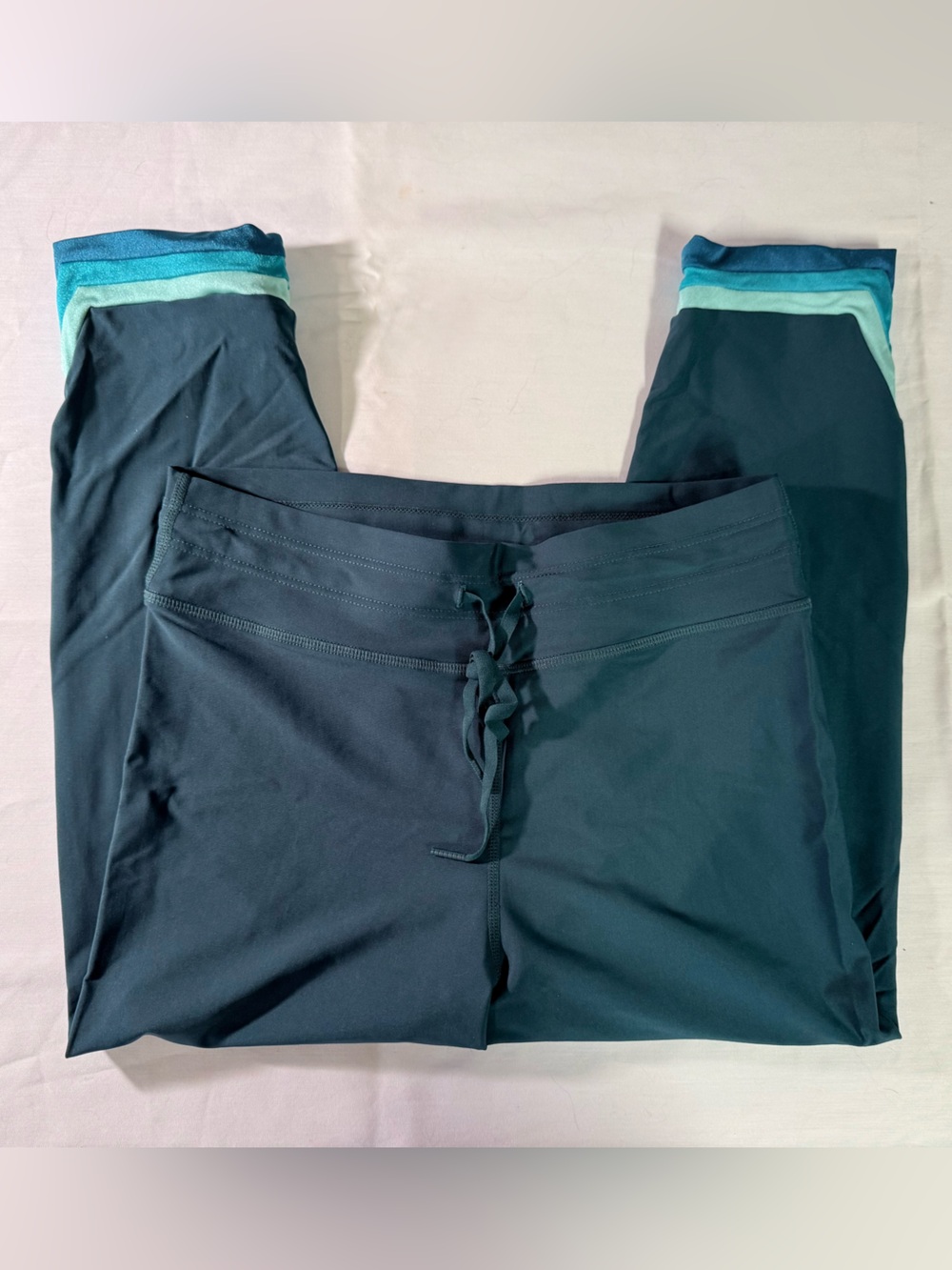 The Upside Women’s teal Capri Pants with Aqua Trim